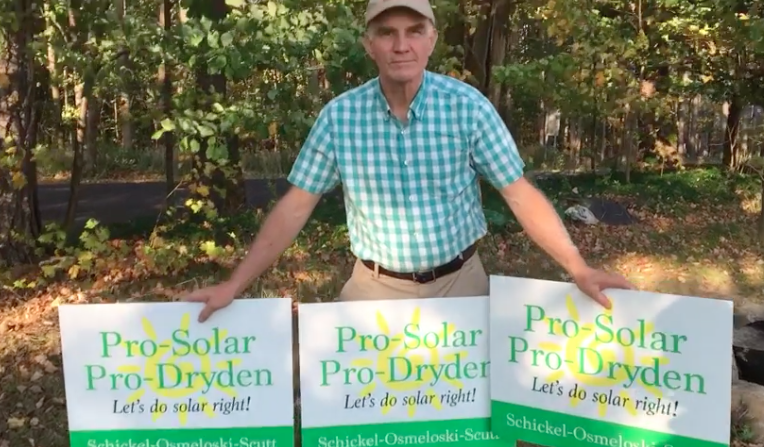 Bruno Schickel, with campaign signs